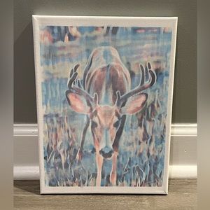Colorful “Deer” canvas sign.